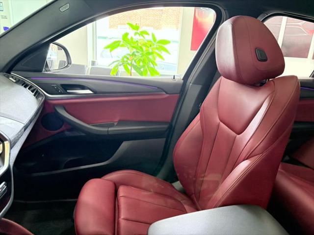 used 2023 BMW X4 car, priced at $40,850