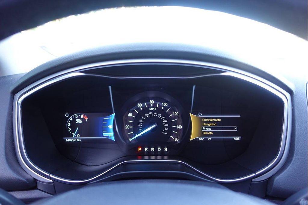 used 2016 Ford Fusion car, priced at $7,994