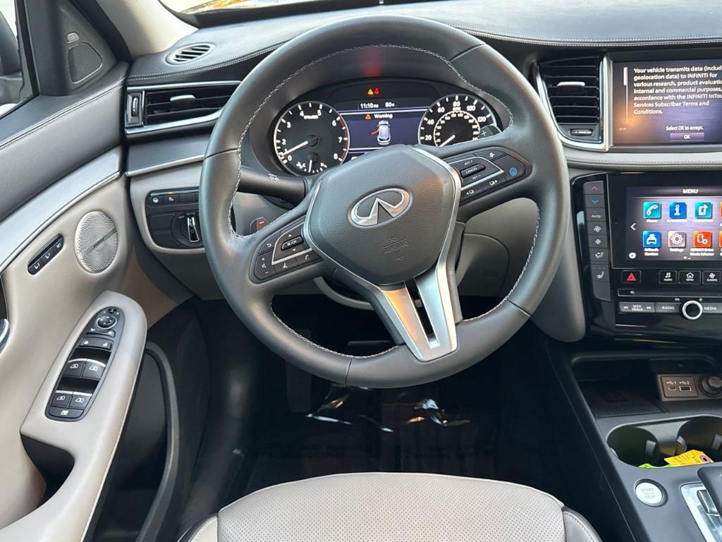 used 2025 INFINITI QX50 car, priced at $38,985