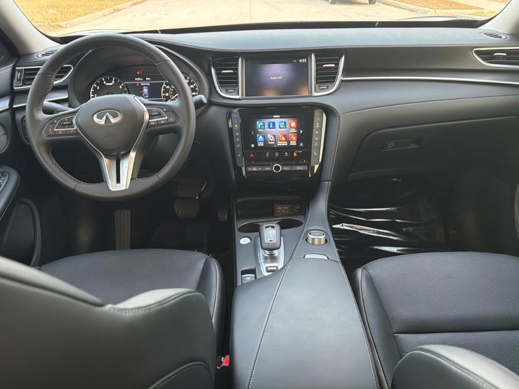 used 2025 INFINITI QX50 car, priced at $37,984