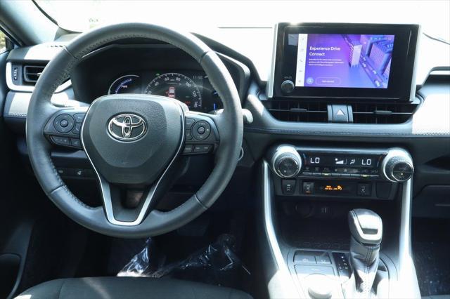 used 2023 Toyota RAV4 Hybrid car, priced at $30,700