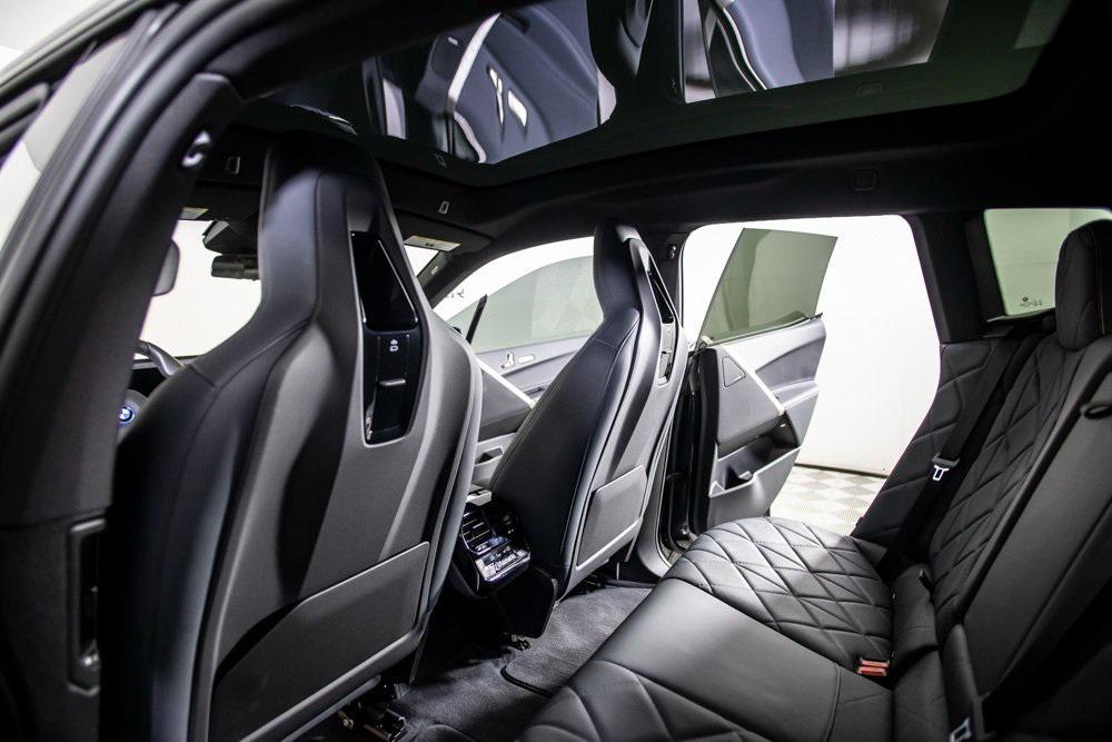 used 2024 BMW iX car, priced at $56,000