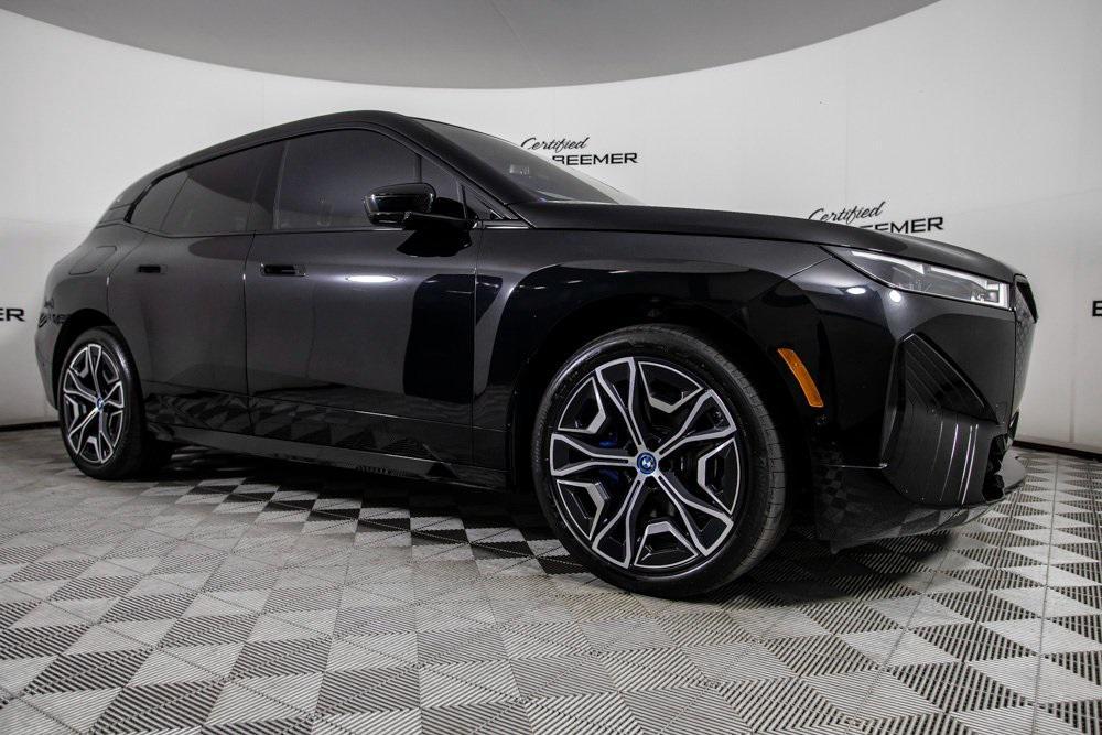 used 2024 BMW iX car, priced at $56,000