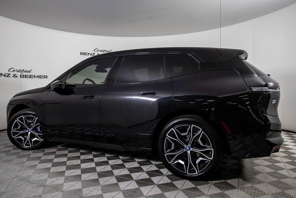 used 2024 BMW iX car, priced at $56,000