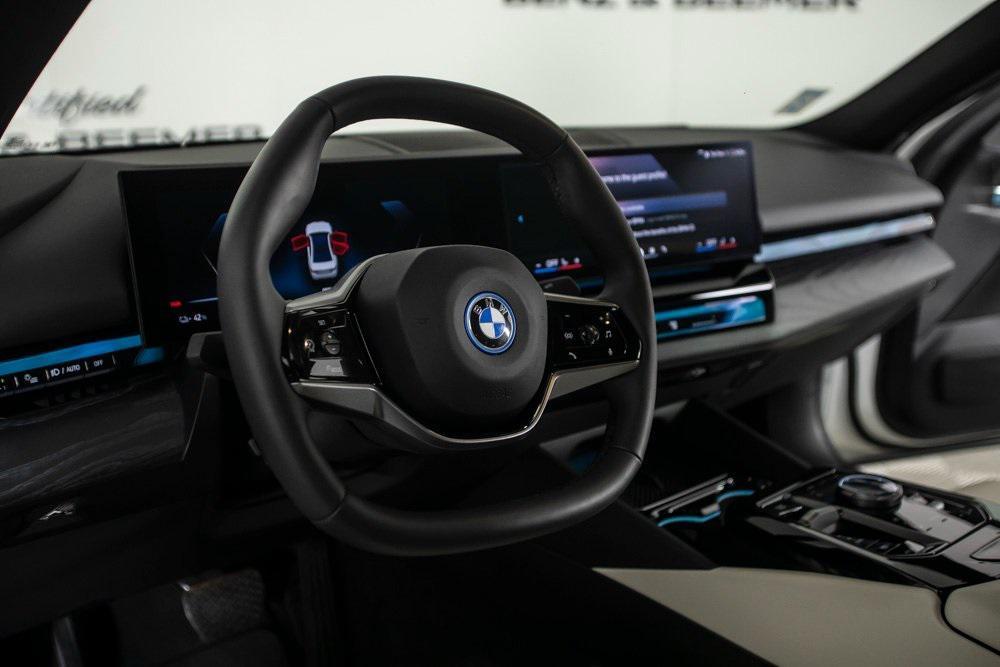 used 2024 BMW i5 car, priced at $47,000