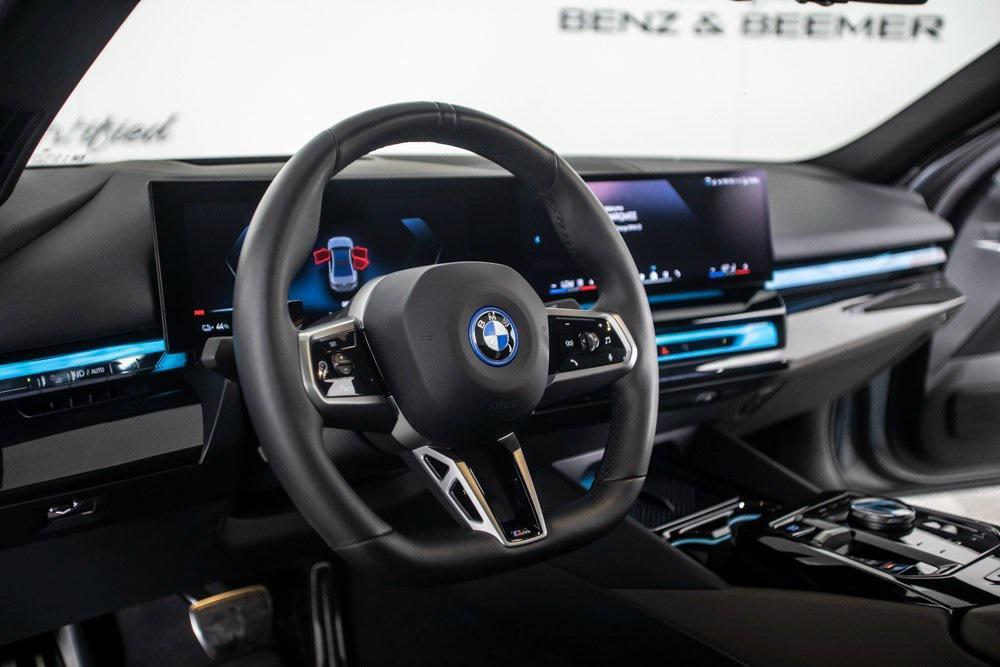 used 2024 BMW i5 car, priced at $47,000