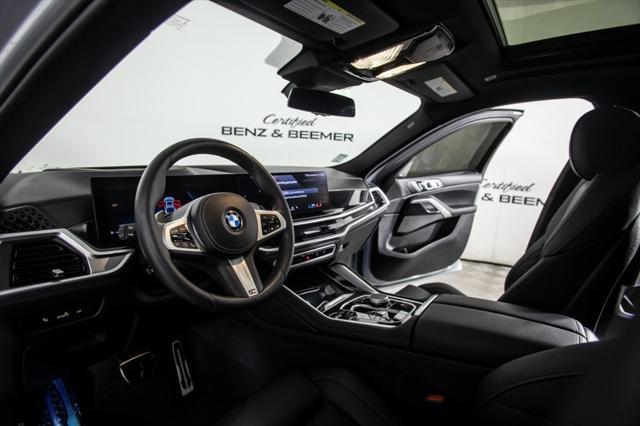 used 2024 BMW X6 car, priced at $77,000