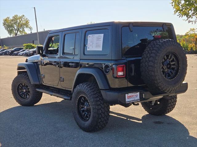 used 2023 Jeep Wrangler car, priced at $48,733