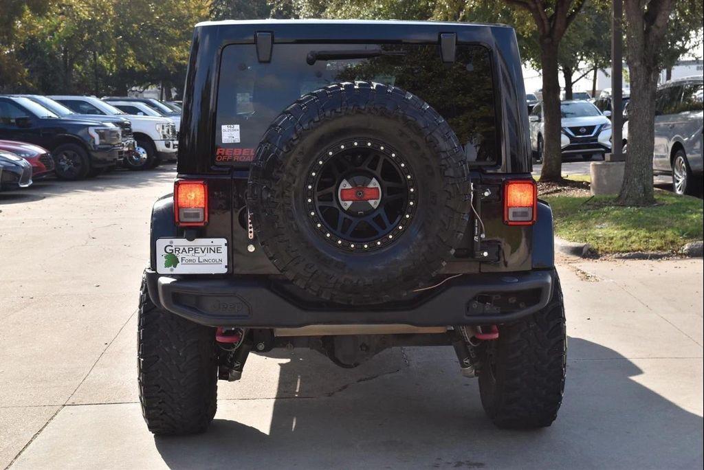 used 2016 Jeep Wrangler Unlimited car, priced at $23,433