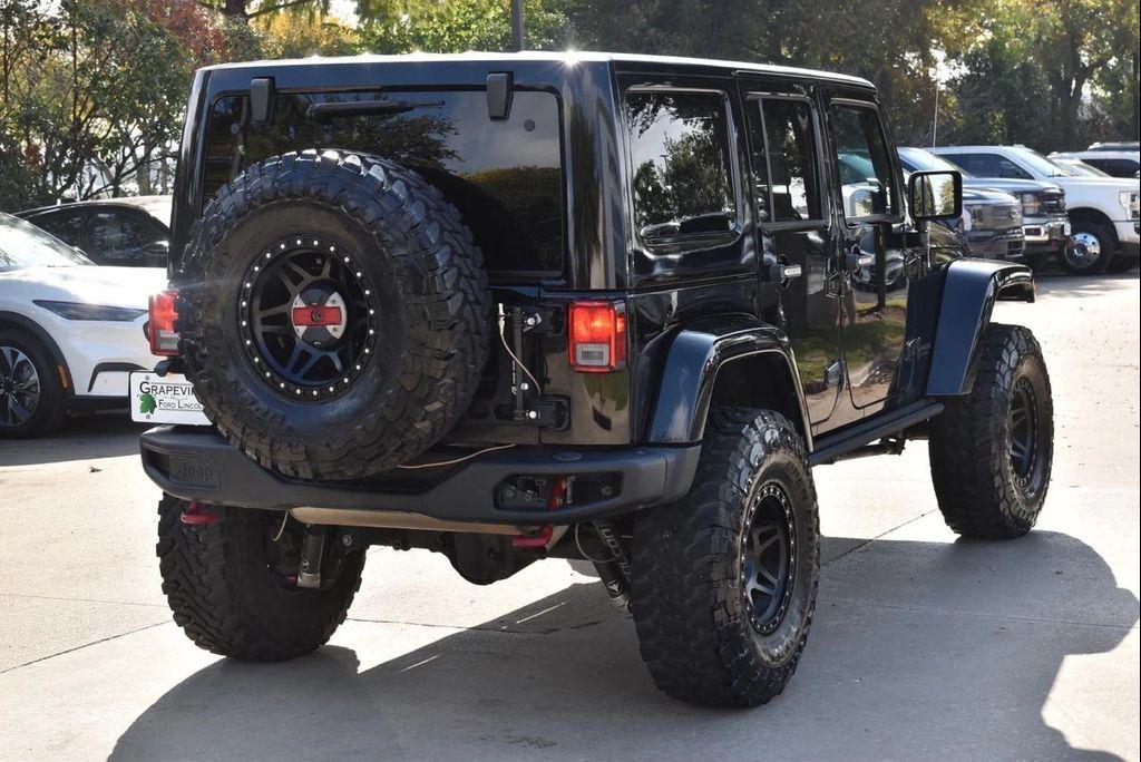 used 2016 Jeep Wrangler Unlimited car, priced at $23,433