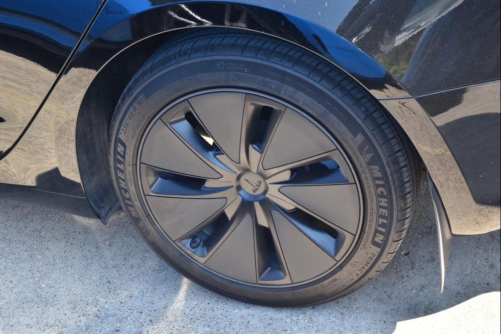 used 2025 Tesla Model 3 car, priced at $36,944