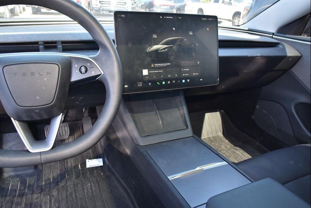 used 2025 Tesla Model 3 car, priced at $36,944