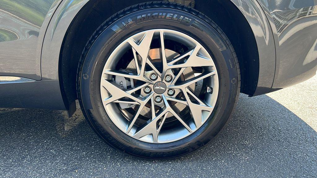 used 2023 Genesis GV70 car, priced at $37,998