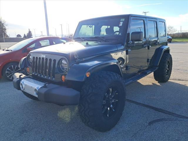 used 2010 Jeep Wrangler Unlimited car, priced at $13,489