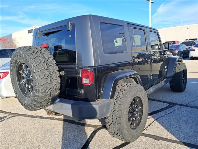 used 2010 Jeep Wrangler Unlimited car, priced at $13,489