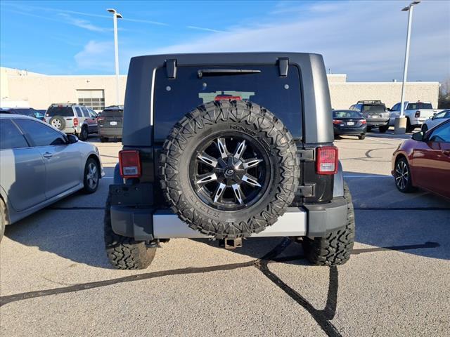 used 2010 Jeep Wrangler Unlimited car, priced at $13,489