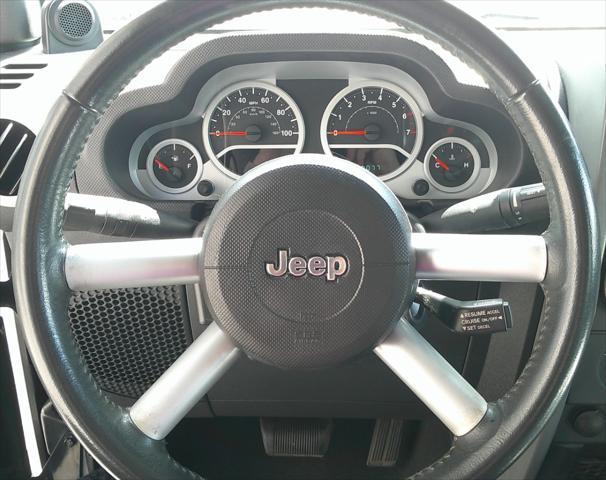 used 2010 Jeep Wrangler Unlimited car, priced at $14,980