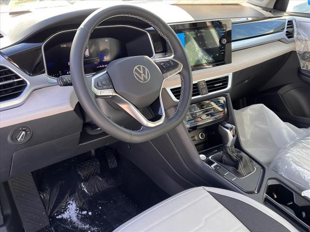 new 2025 Volkswagen Taos car, priced at $29,228