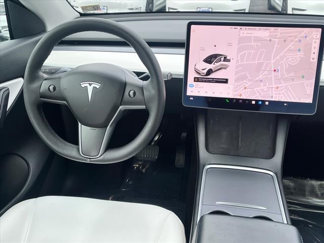 used 2021 Tesla Model Y car, priced at $27,000