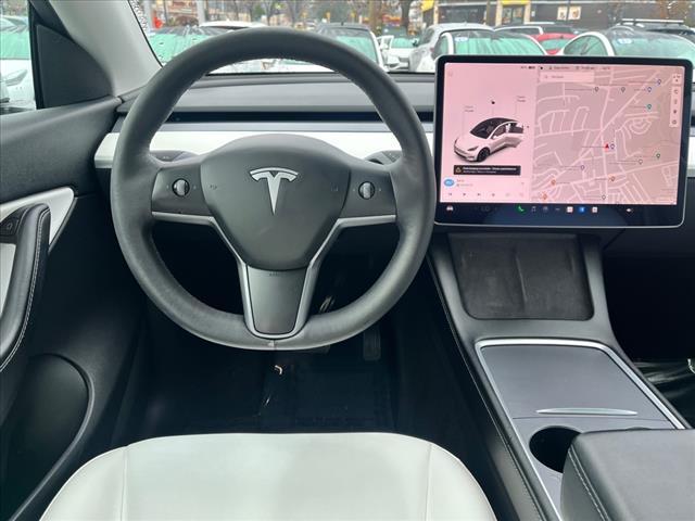 used 2021 Tesla Model Y car, priced at $27,000