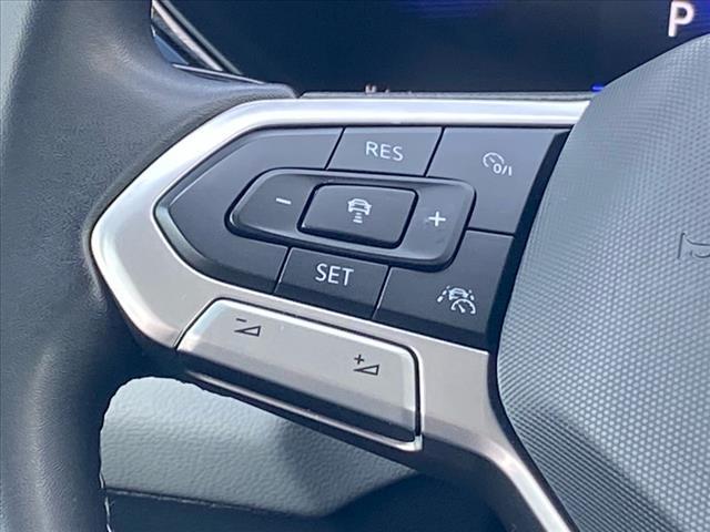 used 2022 Volkswagen Taos car, priced at $20,000