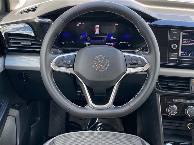 used 2023 Volkswagen Taos car, priced at $21,200