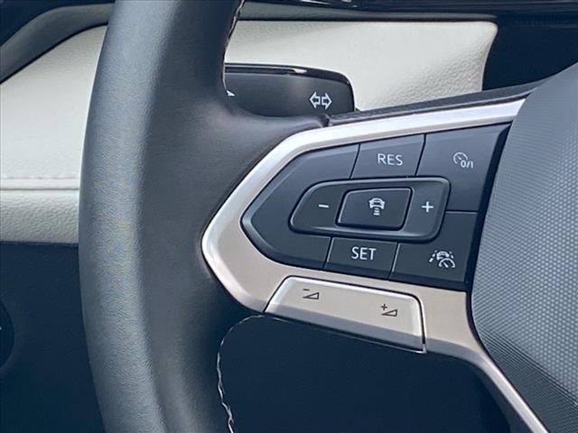 used 2025 Volkswagen Taos car, priced at $24,200
