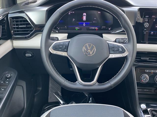 used 2025 Volkswagen Taos car, priced at $24,200