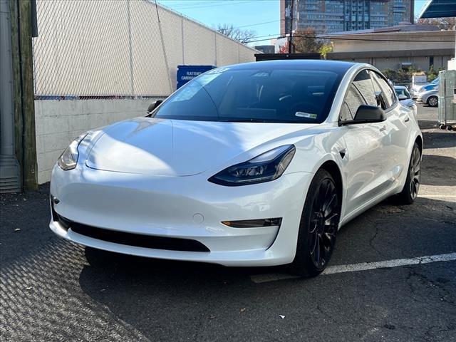 used 2023 Tesla Model 3 car, priced at $34,500