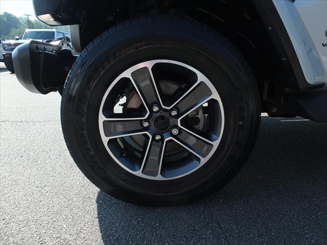 used 2023 Jeep Wrangler car, priced at $34,936