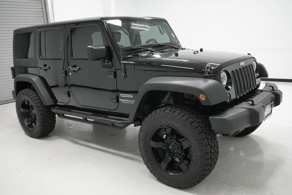 used 2014 Jeep Wrangler Unlimited car, priced at $19,999