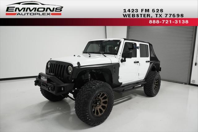 used 2016 Jeep Wrangler Unlimited car, priced at $23,999