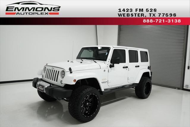 used 2014 Jeep Wrangler Unlimited car, priced at $22,999