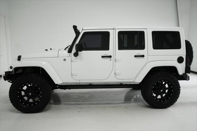 used 2014 Jeep Wrangler Unlimited car, priced at $23,999