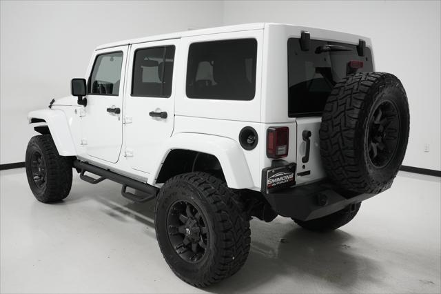 used 2014 Jeep Wrangler Unlimited car, priced at $23,999