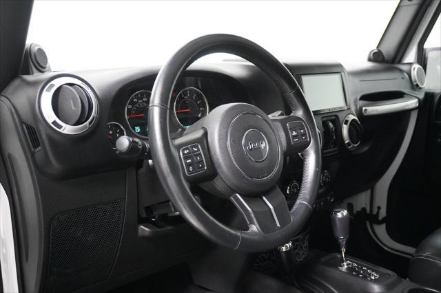 used 2014 Jeep Wrangler Unlimited car, priced at $23,999
