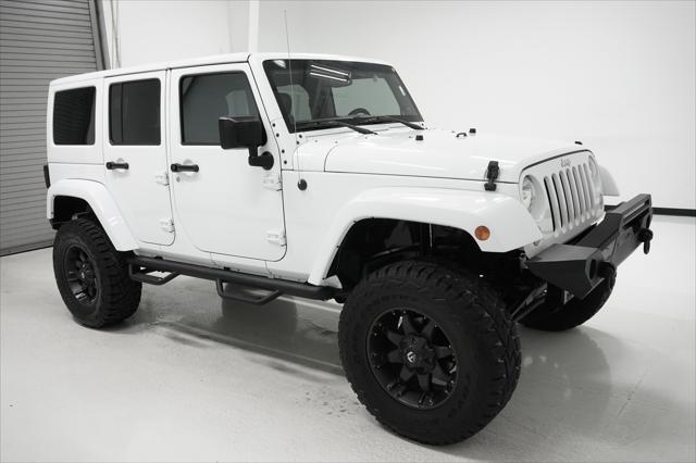 used 2014 Jeep Wrangler Unlimited car, priced at $23,999