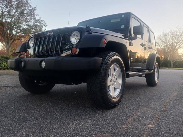 used 2012 Jeep Wrangler Unlimited car, priced at $14,995