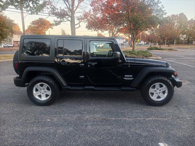 used 2012 Jeep Wrangler Unlimited car, priced at $14,995