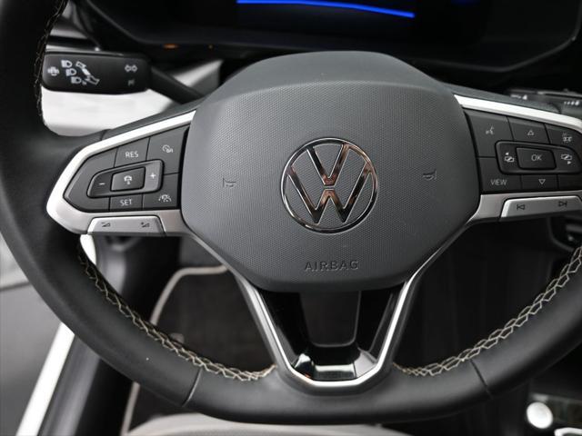 used 2023 Volkswagen Taos car, priced at $22,800