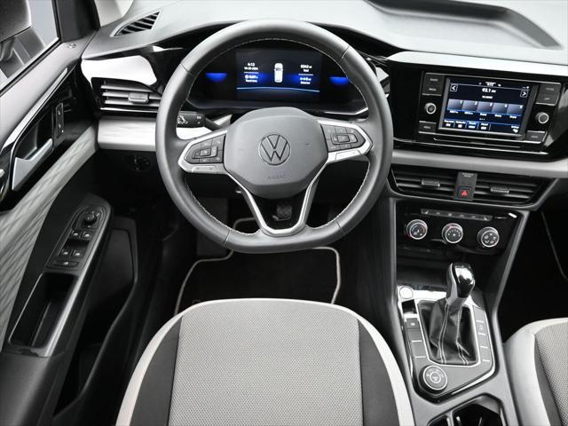 used 2023 Volkswagen Taos car, priced at $22,800