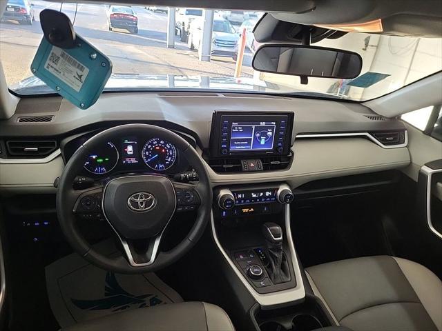 used 2021 Toyota RAV4 Hybrid car, priced at $30,000