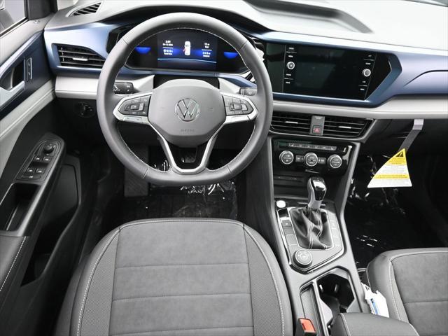 used 2024 Volkswagen Taos car, priced at $26,555