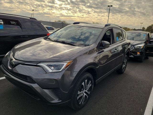 used 2018 Toyota RAV4 car, priced at $20,000