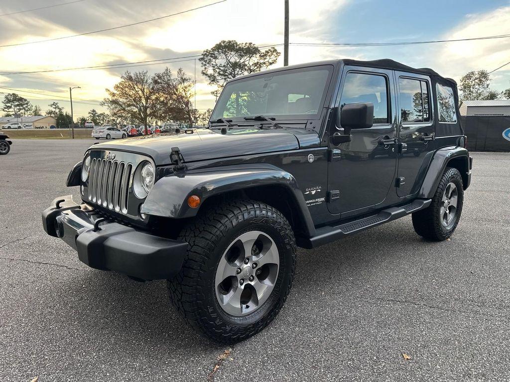used 2018 Jeep Wrangler JK Unlimited car, priced at $23,988