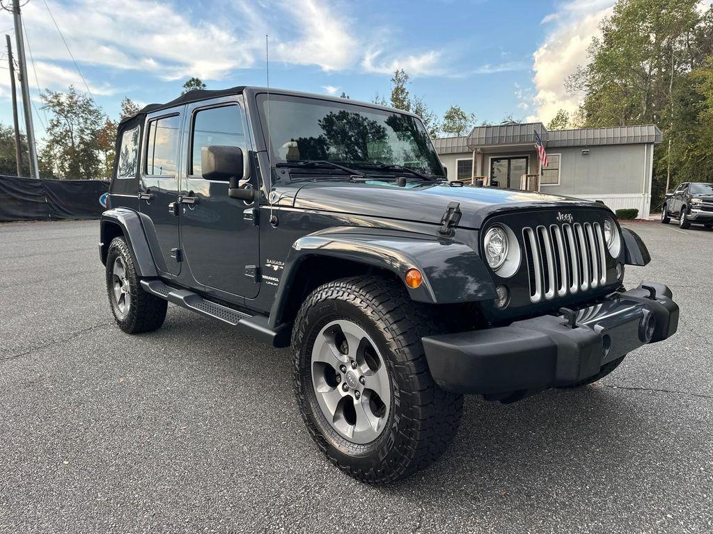 used 2018 Jeep Wrangler JK Unlimited car, priced at $23,988