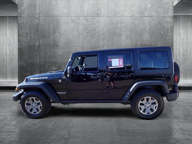 used 2015 Jeep Wrangler Unlimited car, priced at $15,598