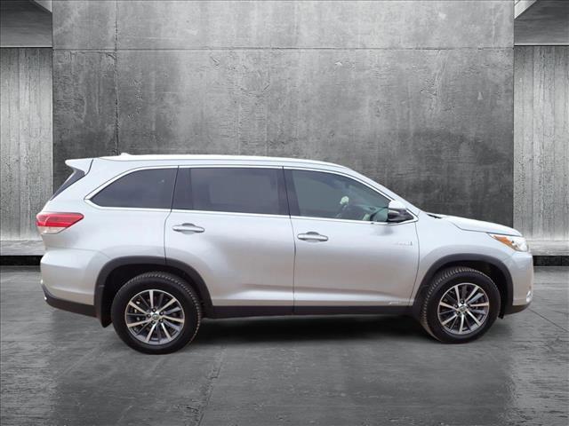 used 2019 Toyota Highlander Hybrid car, priced at $31,998