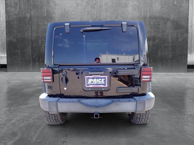 used 2011 Jeep Wrangler Unlimited car, priced at $13,598