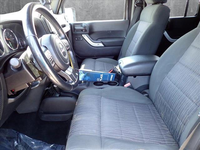 used 2011 Jeep Wrangler Unlimited car, priced at $13,598